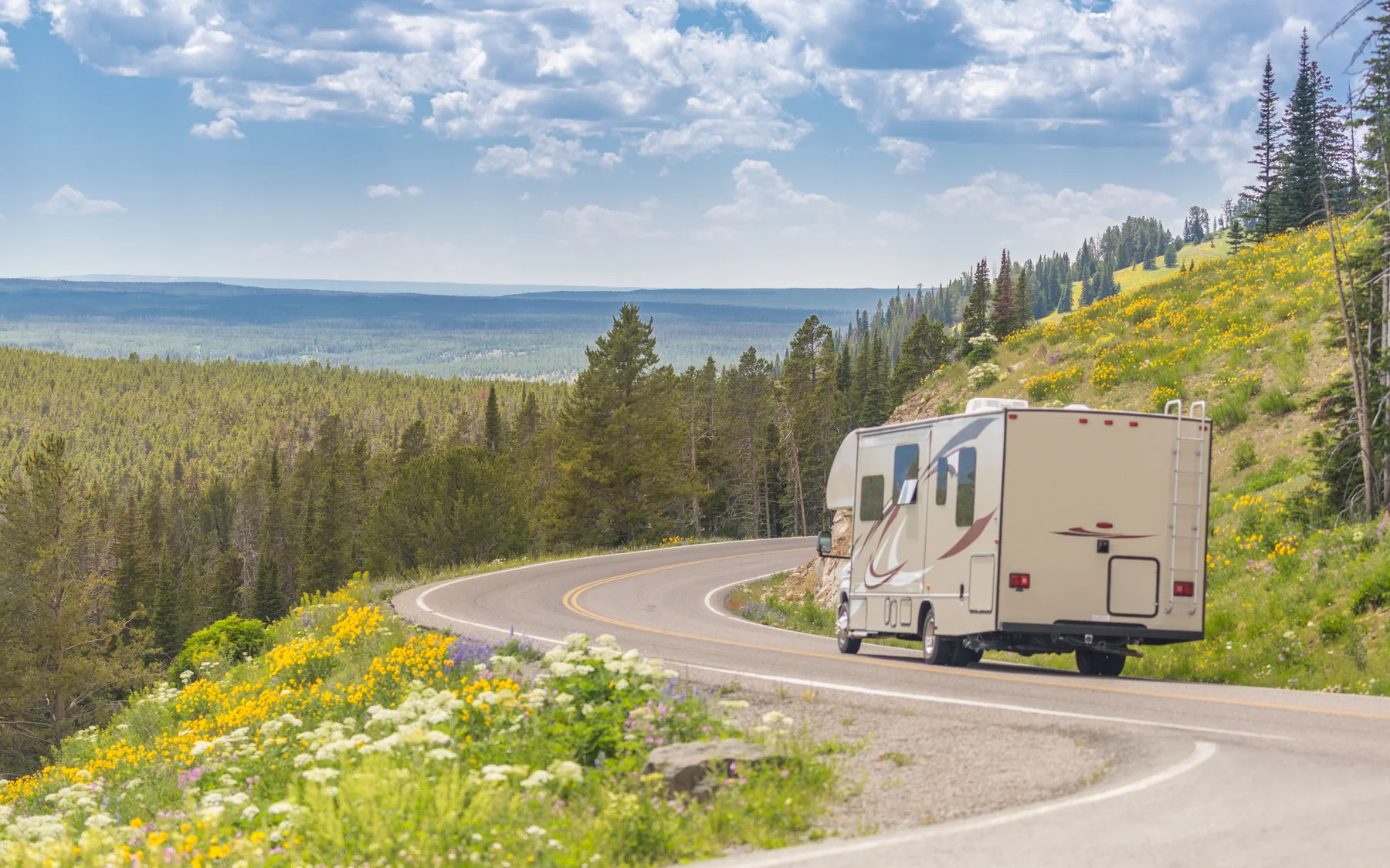 RV Service in Ashland Travel trailer in regional mountain scenery