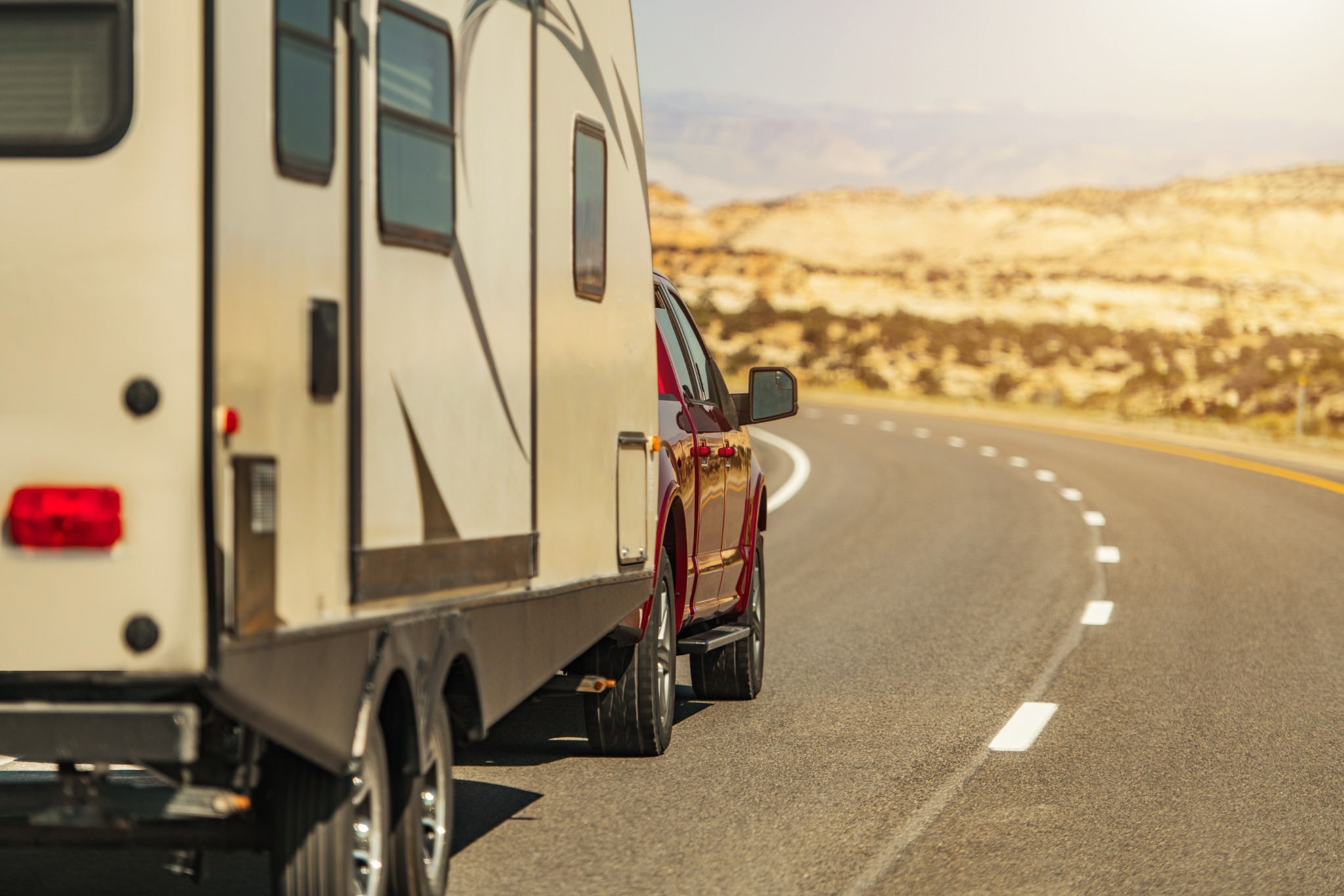 Travel Trailer on an Open Highway Travel trailer being towed on an open highway