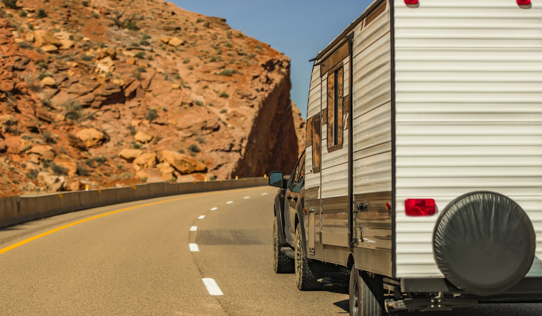 RV Service in Medford Travel trailer in regional mountain scenery