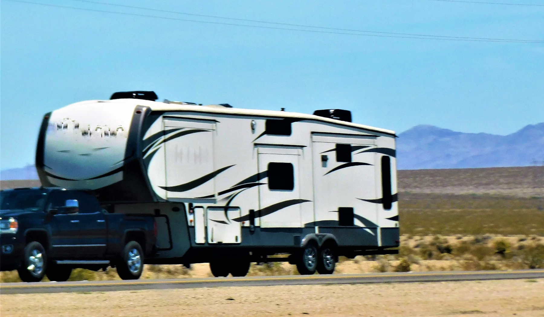 Travel trailer ready for coach-side RV service in Central Point, Oregon